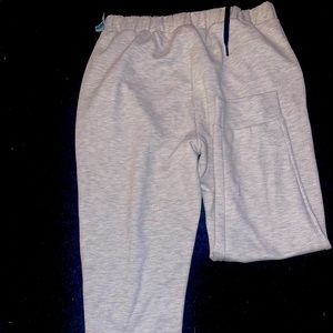 Woman’s grey sweats